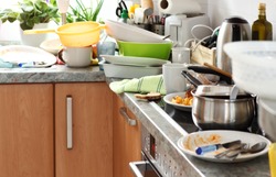 Pile of dirty dishes in the kitchen - Compulsive Hoarding Syndrom
