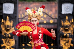 Balinese girl performing traditional dress in bali, indonesia