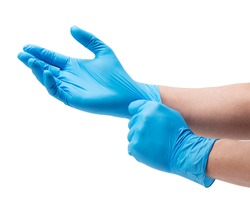 Two hands of a man wearing nitrile gloves on a white background