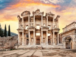 Facade of the library of Celsus in Ephesus under a dramatic sky. Turkey. Panorama
