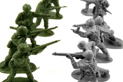 toy army men standing at odds