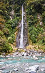 Thunder creek fall in tropical forest of New Zealand