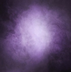 Abstract texture of the purple smoke over black background