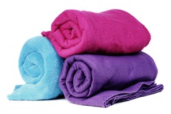 Three colorful fleece blankets