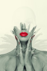 Double Exposure of a beautiful woman with red lipstick and tropical palms