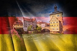Bamberg. Scenic view of Old Town Hall of Bambergwith two bridges over the Regnitz river on German flag overlay, Bavaria region of Germany