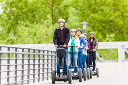 Tourist group having guided Segway city tour in Germany