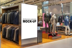 Mockup blank vertical advertising billboard at front of man clothing shop in shopping mall, empty space for insert your graphic announcement and advertisement promotion