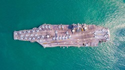 Top View Aircraft Carrier are sailing in the ocean