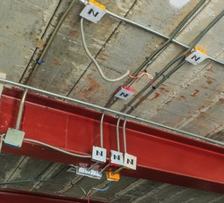 Electric flash- light boxes are installed and connected to power lines, cables and pipes, Wall Building Materials.