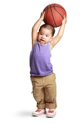 Little boy with basketball, Isolated over white
