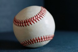 baseball with red stitches isolated