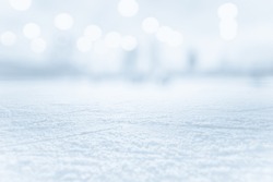 COLD ICE BACKROUND WITH SNOW AND BOKEH LIGHTS, WINTER BACKDROP