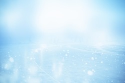 WINTER SPORT ICE HOCKEY FIELD WITH GLOWING ICY SURFACE AND BLUE WHITE HAZE AND GLANCE
