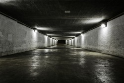 Empty tunnel at night