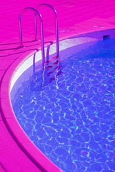 Fashion tropical minimal location.  Swimming pool space. Vapor wave purple colours style wallpaper.  Travel aesthetics