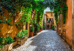 Old street in Trastevere, Rome, Italy. Trastevere is rione of Rome, on the west bank of the Tiber in Rome, Lazio, Italy.  Architecture and landmark of Rome
