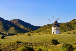 Old wind mill in Cabo de Gata Nijar National Park, Almeria in Spain.