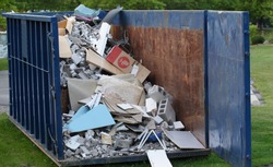 Dumpster with construction debris
