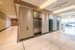 Elevators in the modern lobby, hallway of the luxury hotel, business center, shopping mall in Vancouver, Canada. Interior design.