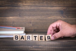 Barter concept. Wooden letters on the office desk, informative and communication background