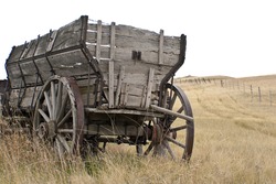 Antique wooden wagon  on the  prairie