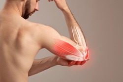 A Man's Grip on His Painful Elbow, human arm pain