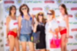 Blurred for background, People on brand wall at beach pool club in summer time