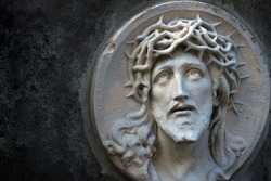 The face of Jesus Christ in a crown of thorns as a symbol of suffering and salvation of mankind. (healing, spiritual development, religious events - the concept)