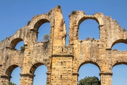 Aqueduct in Aspendos, Antalya. Ruin. An ancient Roman aqueduct that supplied Aspendos with water. Arched structure. 