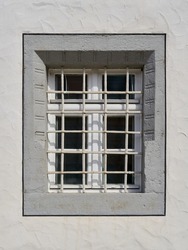  single window with window grille in the old town of Wittenberg in Germany                              