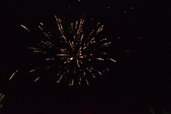  fireworks, splashes of light in the black night sky, holiday. High quality photo