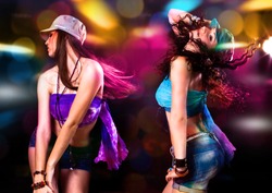 girls dancing in discolight
