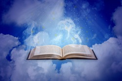 Holy bible open book  with cloud and sun ray nature background.