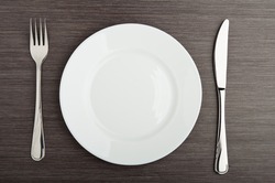 table setting. plate fork knife white empty