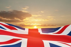 National flags of United Kingdom on sunset sky background. Background with place for your text. 3d rendering.