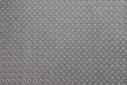 A diagonal pattern on gray metal