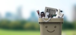 Recycling bin full of electronic waste, smiling cute character