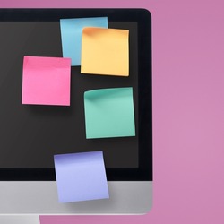 Colorful sticky notes on the computer screen, ideas and planning concept