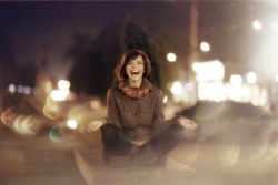 soft blurred portrait happy girl in the autumn night city