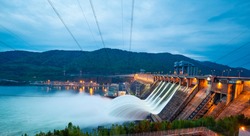 view of the hydroelectric dam, water discharge through locks, long exposure shooting
