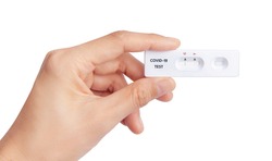 Hand show Coronavirus Covid-19 laboratory self test Quick Antigen Detection Testing fast antibody point of care testing with Positive result