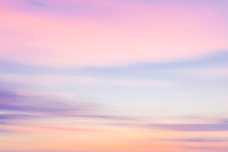 Defocused sunset sky nature background with blurred panning motion.