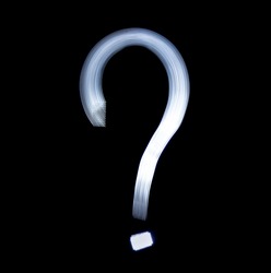 Question mark Symbol Icon Using Light Painting Technique isolated over black Background