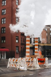 Steam venting from the street in New York.