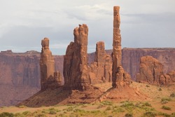 Totem Pole and Yei Bi Chei Spires in Monument Valley, Arizona, United States.