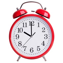 Red round alarm clock shows exactly ten