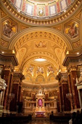interior of large  heavily decorated basilica