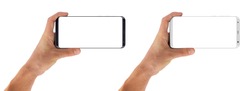Smartphone horizontal in hand, bezel less modern design. Black and white version