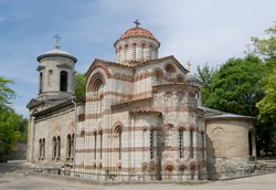 This church of St John the Baptist, 8th century was founded  in Kerch (Crimea) during the period of Khazar rule. The stone church is rounded by green spring trees.
